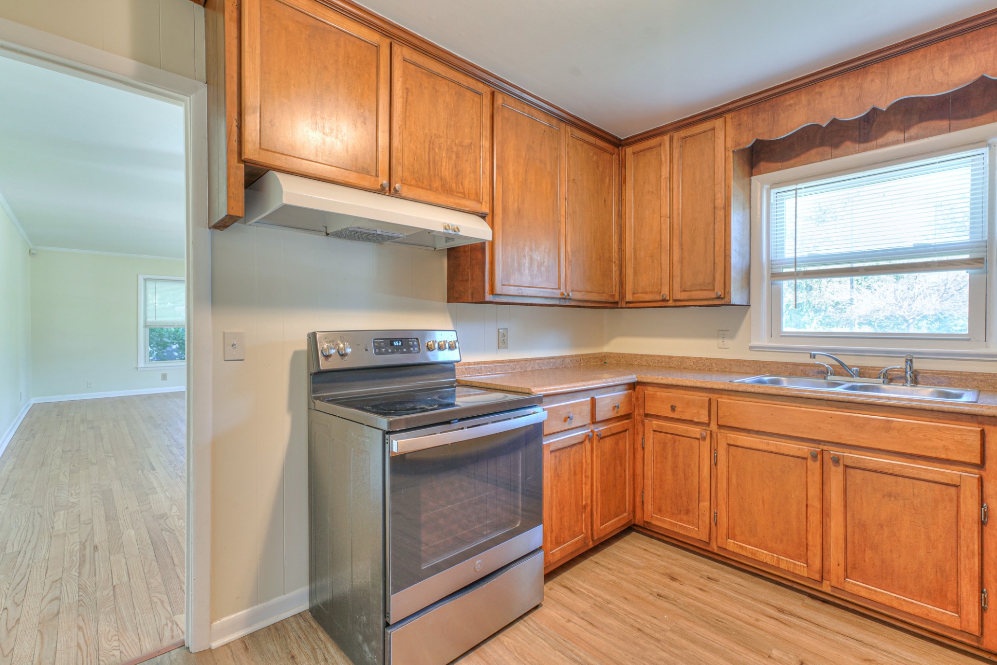 1827 Middle Tennessee Boulevard Murfreesboro, TN 37130 - Photo 18 of 21 a kitchen with a sink stove and cabinets