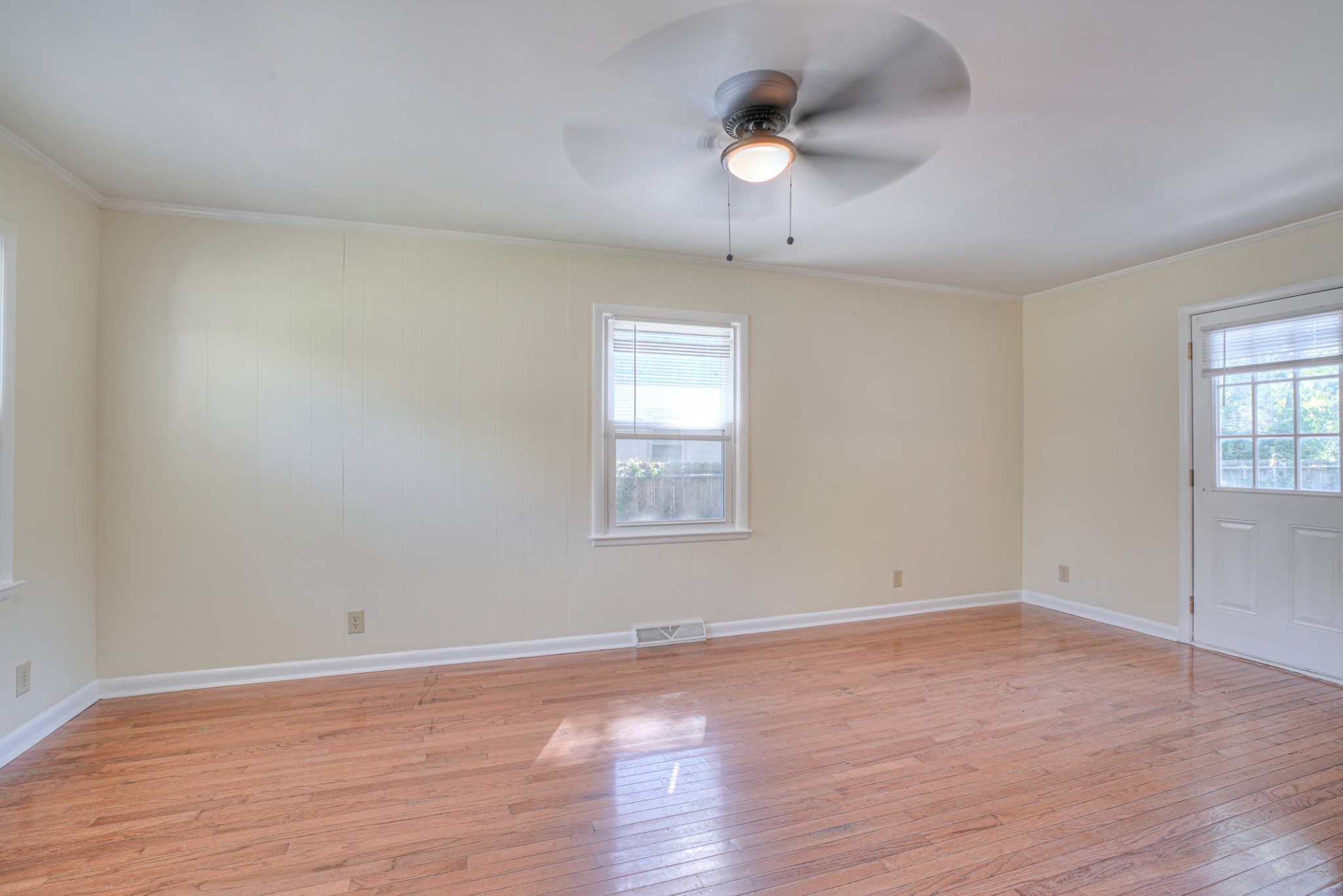 1827 Middle Tennessee Boulevard Murfreesboro, TN 37130 - Photo 20 of 21 a view of an empty room with wooden floor and a window