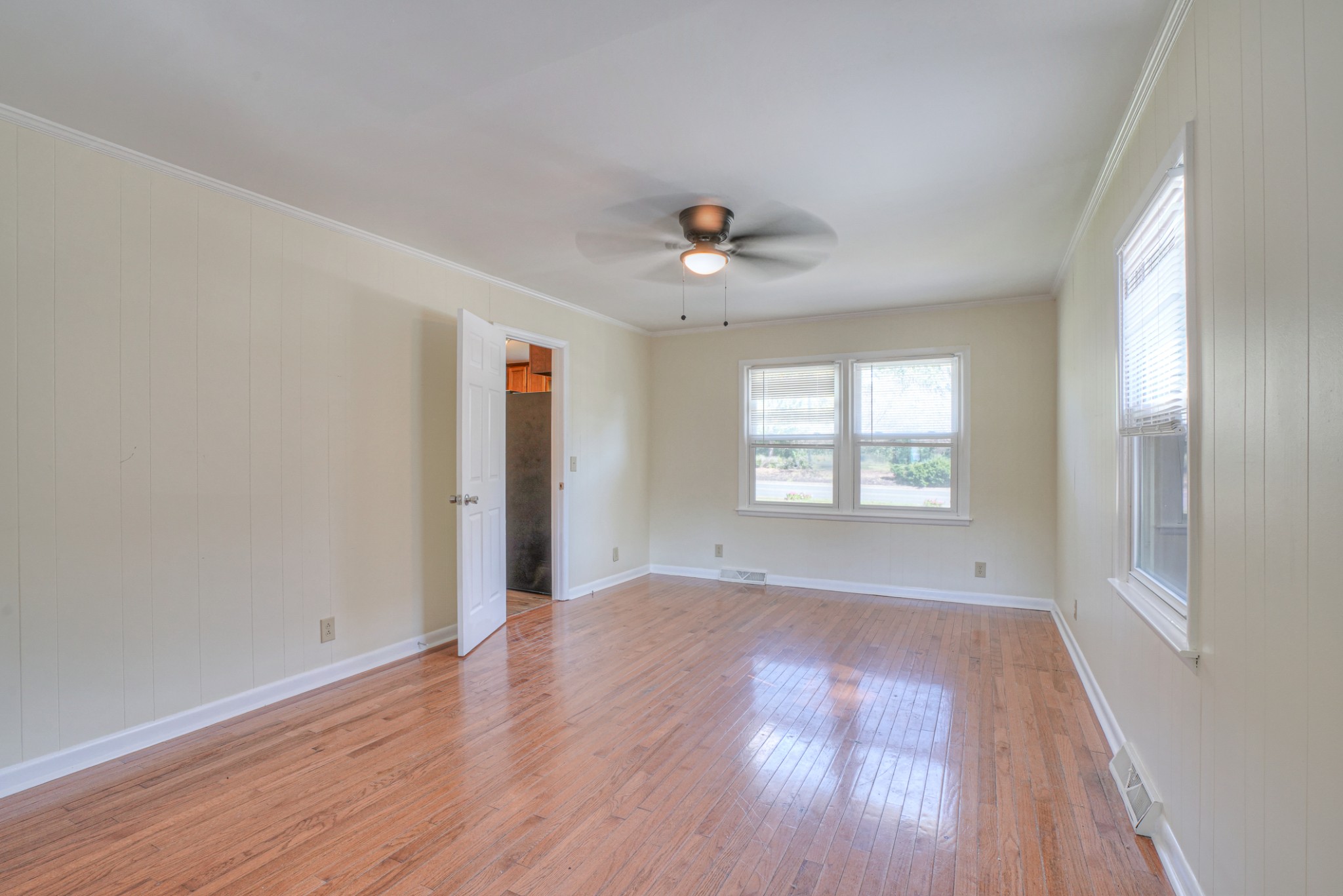 1827 Middle Tennessee Boulevard Murfreesboro, TN 37130 - Photo 21 of 21 an empty room with wooden floor and windows