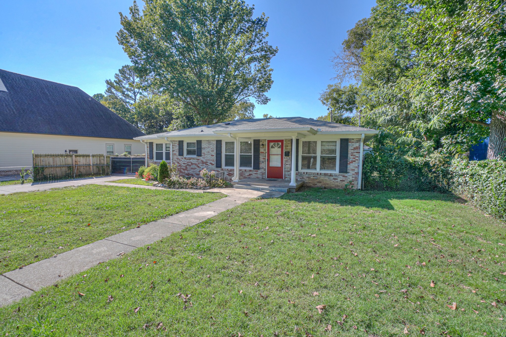 1827 Middle Tennessee Boulevard Murfreesboro, TN 37130 - Photo 3 of 21 a view of house with a big yard and potted plants