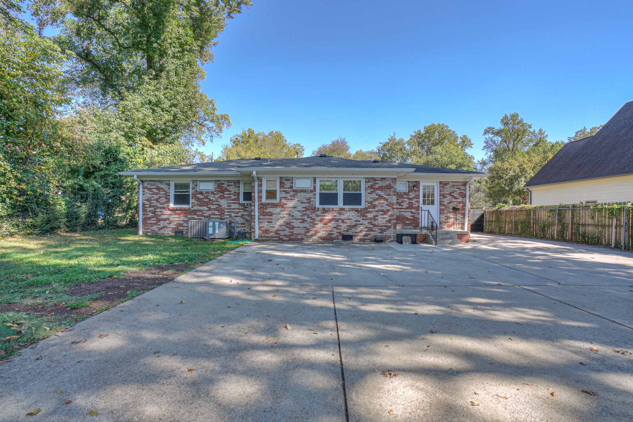 1827 Middle Tennessee Boulevard Murfreesboro, TN 37130 - Photo 8 of 21 a front view of a house with a garden and lake view