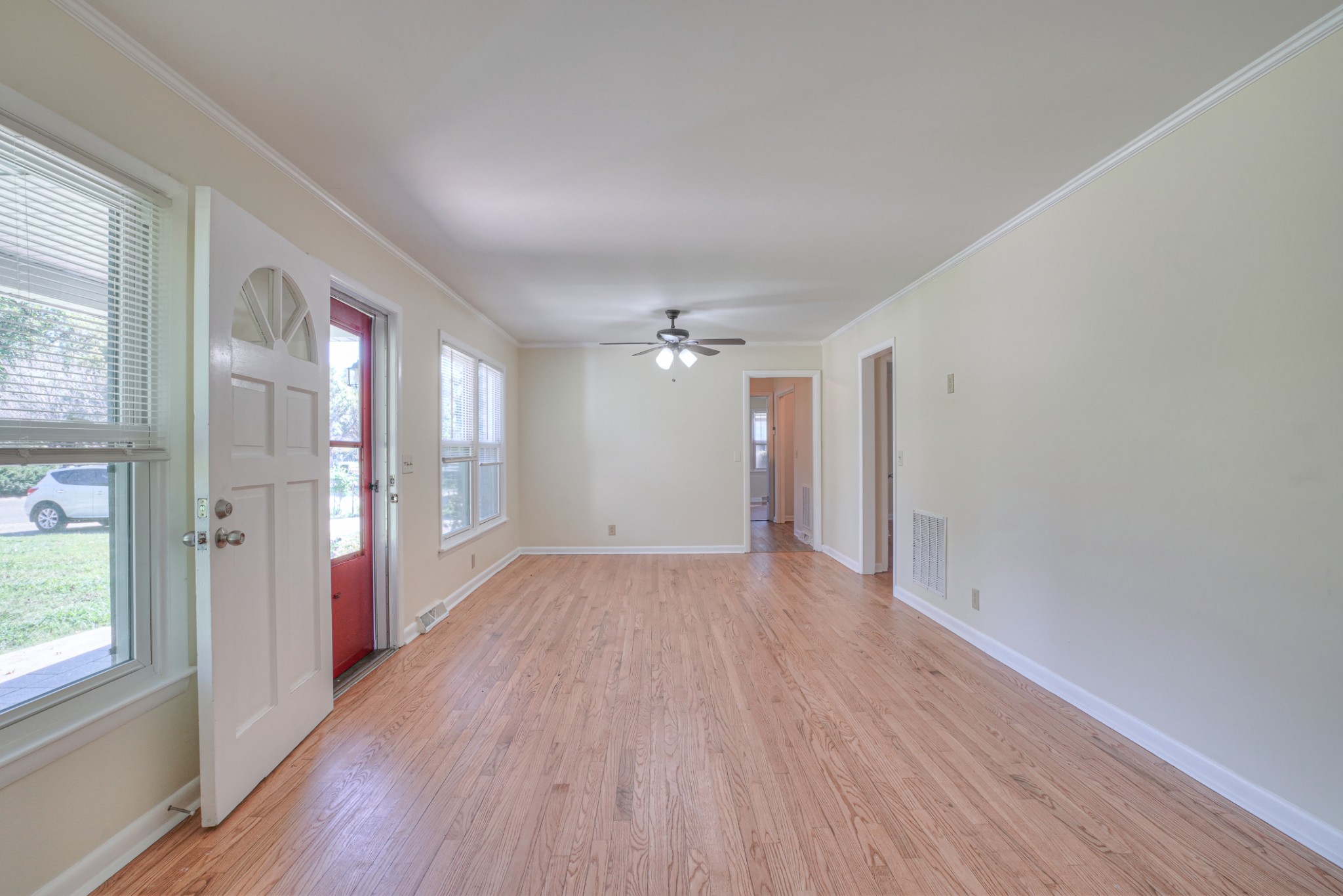 1827 Middle Tennessee Boulevard Murfreesboro, TN 37130 - Photo 9 of 21 a view of a hallway with wooden floor and a window