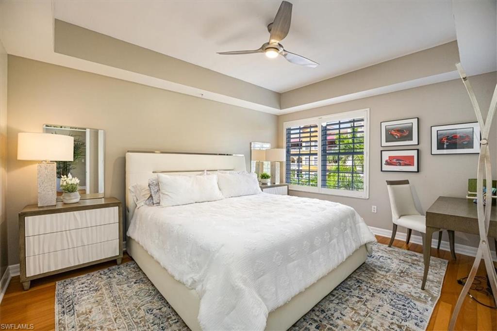 401 Bayfront Place, Unit 3404 Naples, FL 34102 - Photo 8 of 14 a bedroom with a large bed and a window