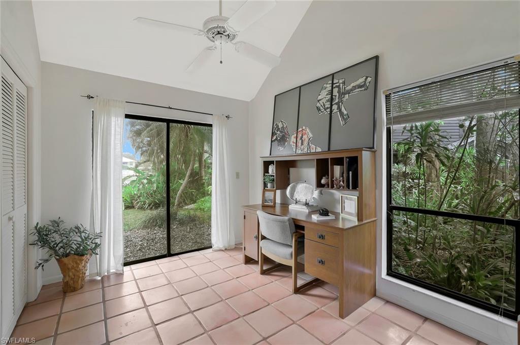 1329 Solana Road, Unit K5 Naples, FL 34103 - Photo 12 of 20 a bedroom with furniture and a window