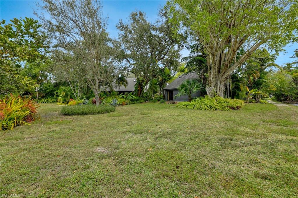1329 Solana Road, Unit K5 Naples, FL 34103 - Photo 20 of 25 View of the back of the home - being an end unit you have room to expand and toenjoy.