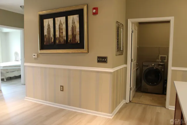 a bathroom with a sink and a washing machine