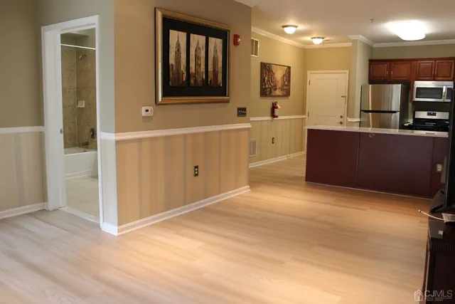 a view of a kitchen with a sink