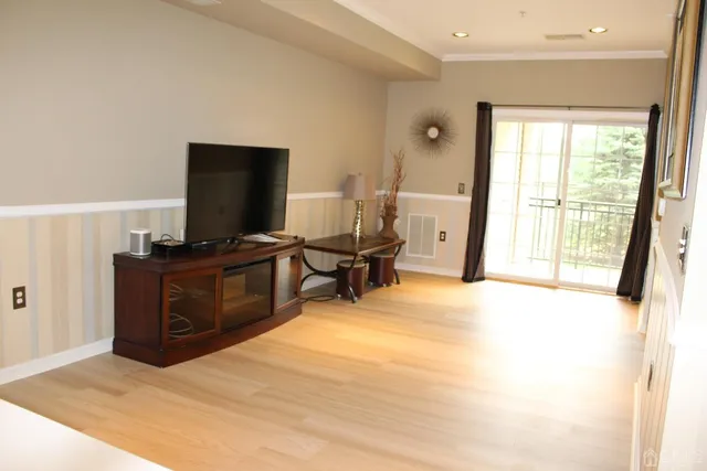 a room with a bed and furniture