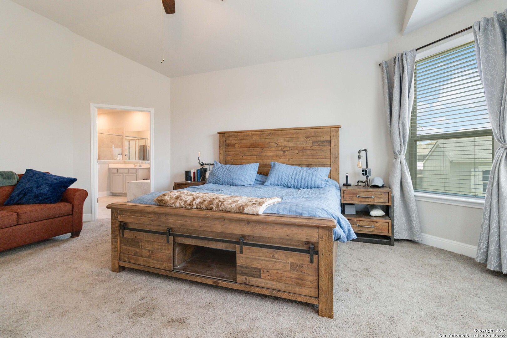 2210 Castello Way San Antonio, TX 78259 - Photo 17 of 48 a bedroom with a bed and a couch