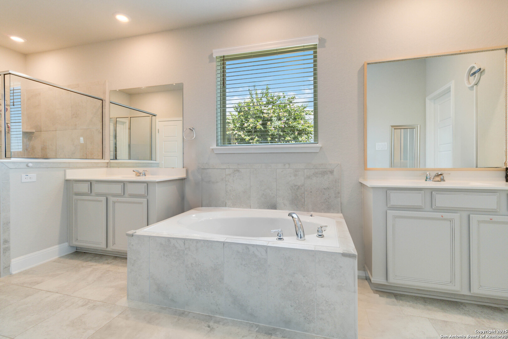 2210 Castello Way San Antonio, TX 78259 - Photo 20 of 48 a bathroom with a bathtub and a sink