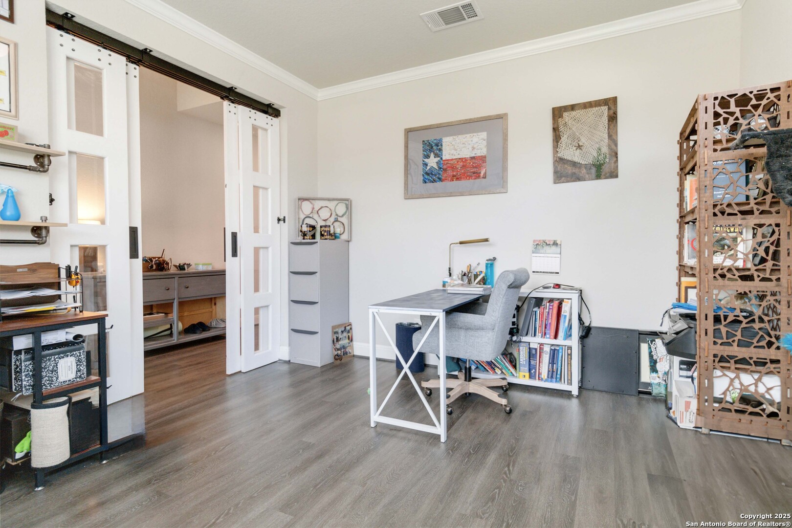 2210 Castello Way San Antonio, TX 78259 - Photo 40 of 48 a view of a workspace with furniture and wooden floor