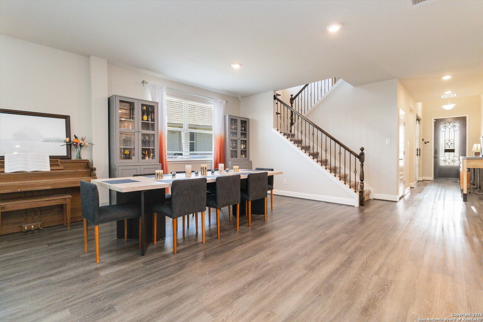 2210 Castello Way San Antonio, TX 78259 - Photo 4 of 48 a view of a dining room with furniture and wooden floor