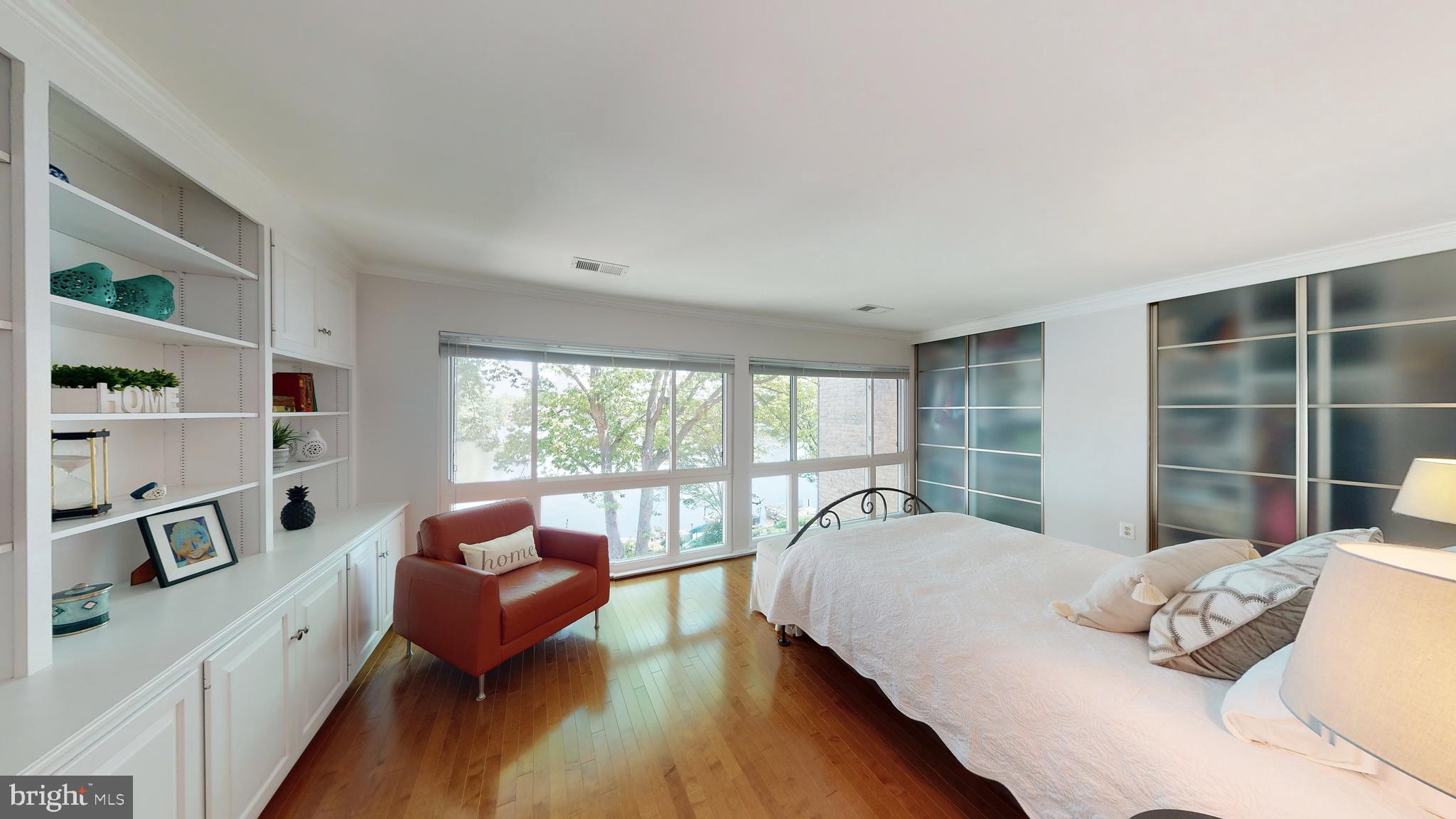 2012 Lakebreeze Way Reston, VA 20191 - Photo 18 of 78 Primary Suite Has Wall Of Windows Overlooking Lake