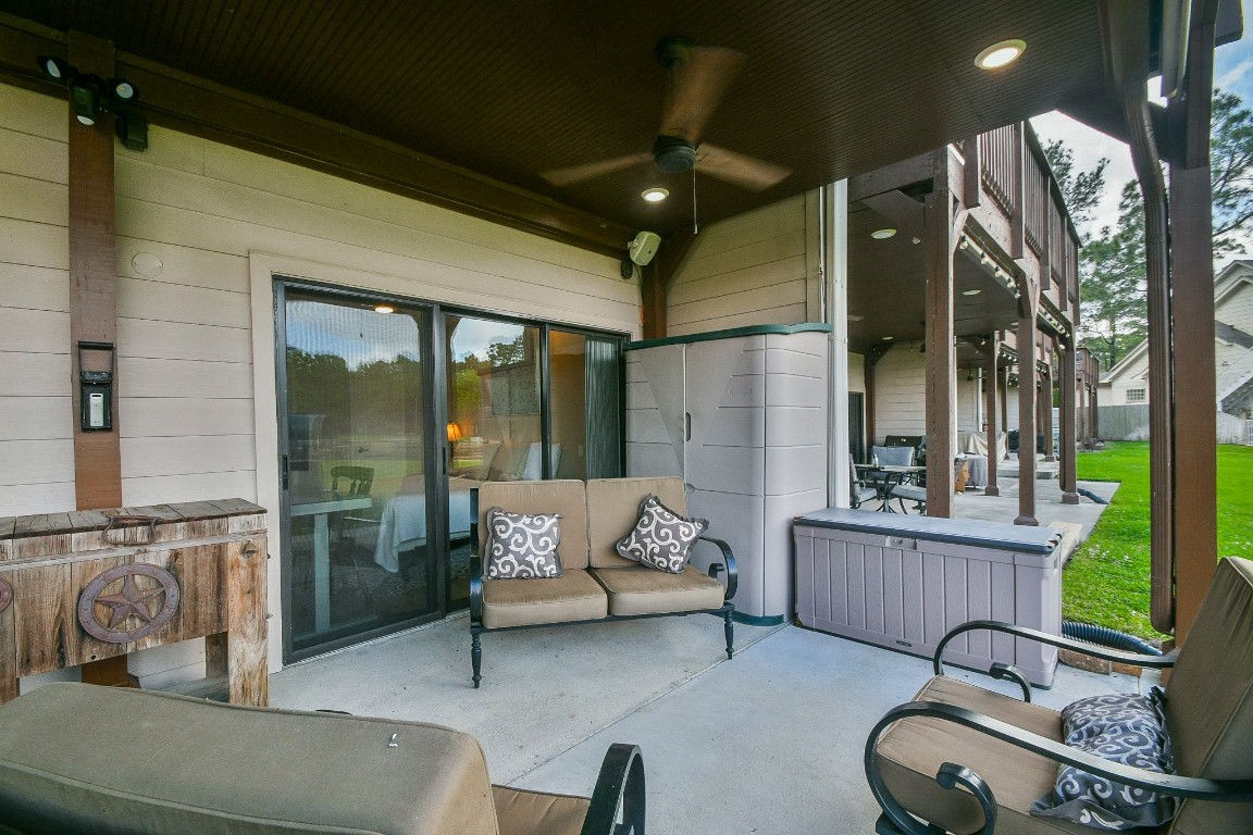 500 River Road, Unit 101 Montgomery, TX 77356 - Photo 16 of 27 Patio lounge area for listening to outdoor music system