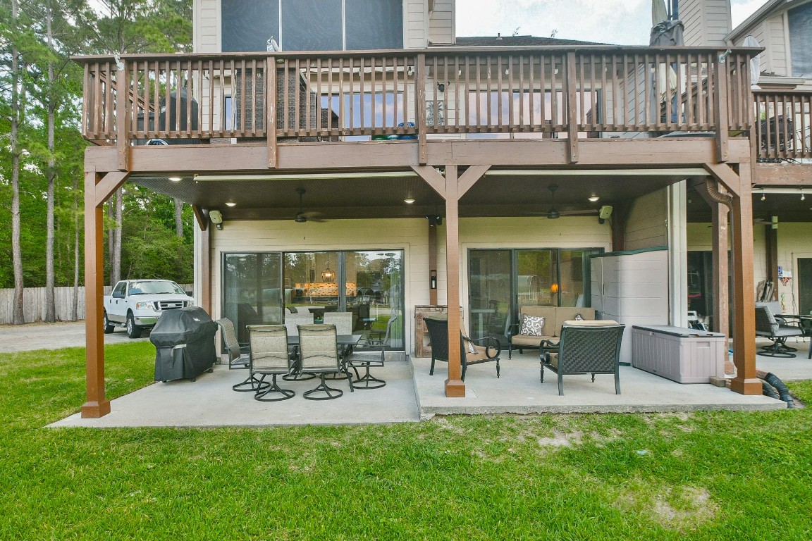 500 River Road, Unit 101 Montgomery, TX 77356 - Photo 17 of 27 Spacious covered patio with storage for boating and fishing supplies