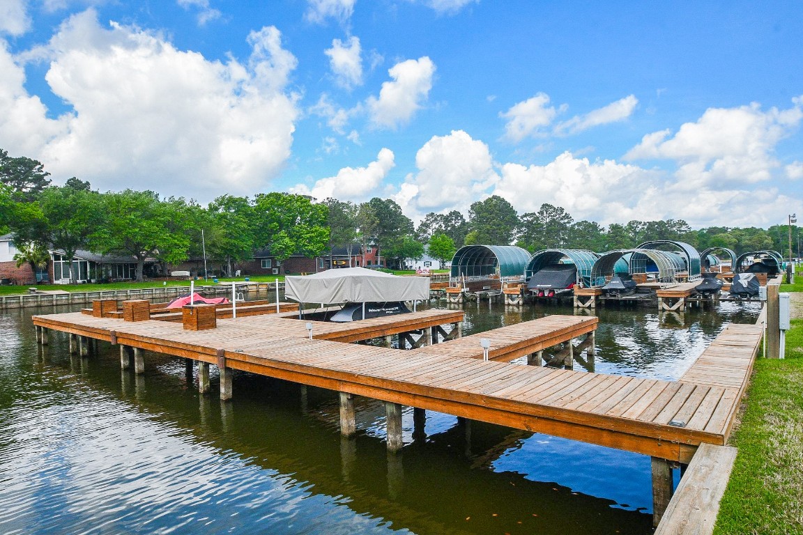 500 River Road, Unit 101 Montgomery, TX 77356 - Photo 18 of 27 TWO boat slips included with property! #1-located on dock 1 with extended decking and custom jet ski lift (remote controlled)