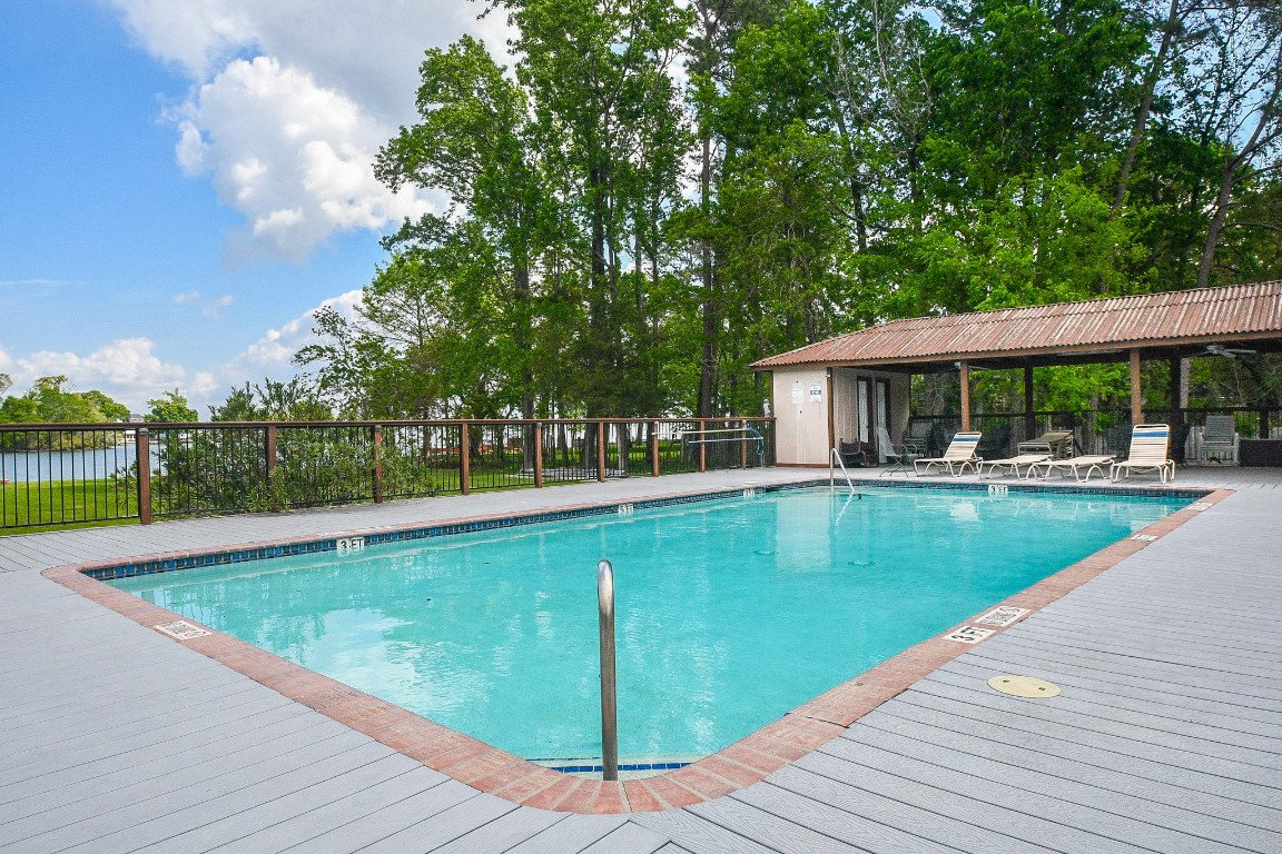 500 River Road, Unit 101 Montgomery, TX 77356 - Photo 22 of 27 Private community pool maintained weekly with outdoor restrooms