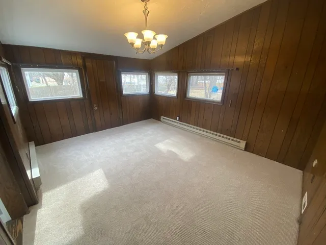 a view of empty room with windows