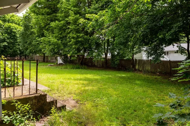 a view of a backyard with a garden