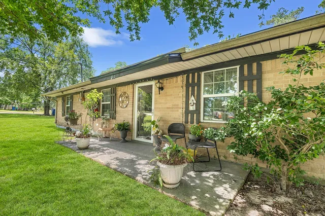 a garden view with a seating space