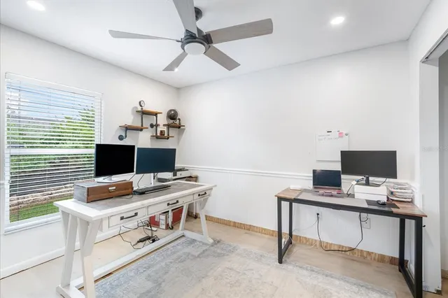 a view of a workspace with furniture