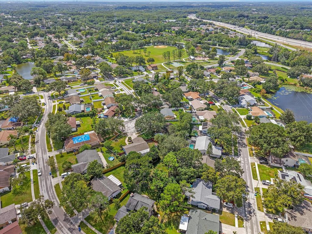 15911 Ironware Place Tampa, FL 33624 - Photo 29 of 31 an aerial view of residential houses with outdoor space
