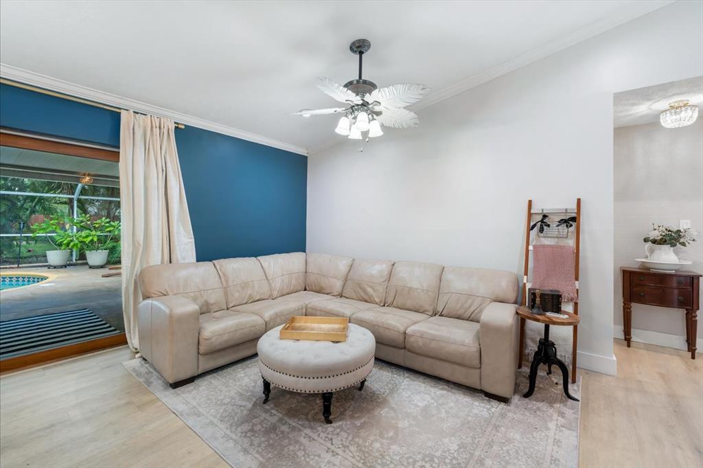 15911 Ironware Place Tampa, FL 33624 - Photo 10 of 31 a living room with furniture and a large window