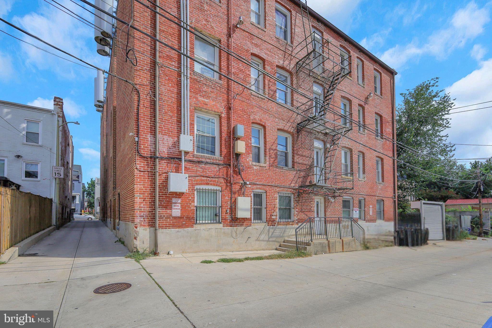 610 Irving Street Northwest, Unit 105 Washington, DC 20010 - Photo 28 of 28 a view of a building with a street