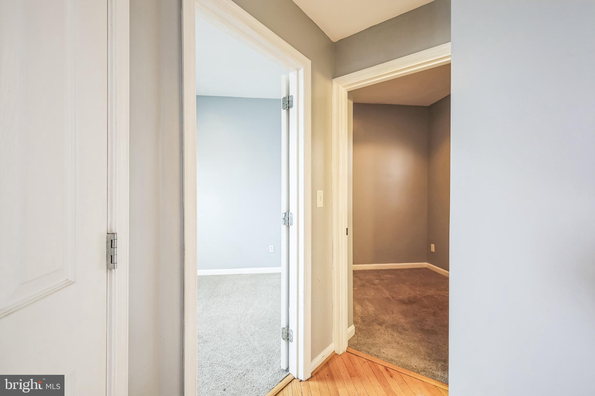 610 Irving Street Northwest, Unit 105 Washington, DC 20010 - Photo 5 of 28 a view of a bathroom from a corridor