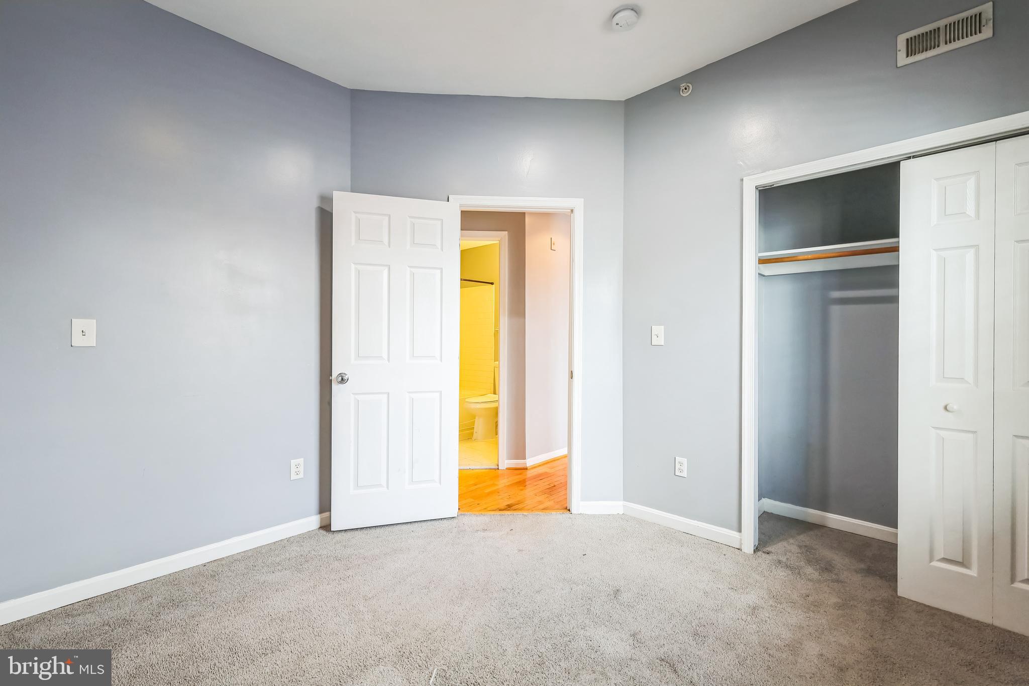 610 Irving Street Northwest, Unit 105 Washington, DC 20010 - Photo 7 of 28 a view of an empty room with a window