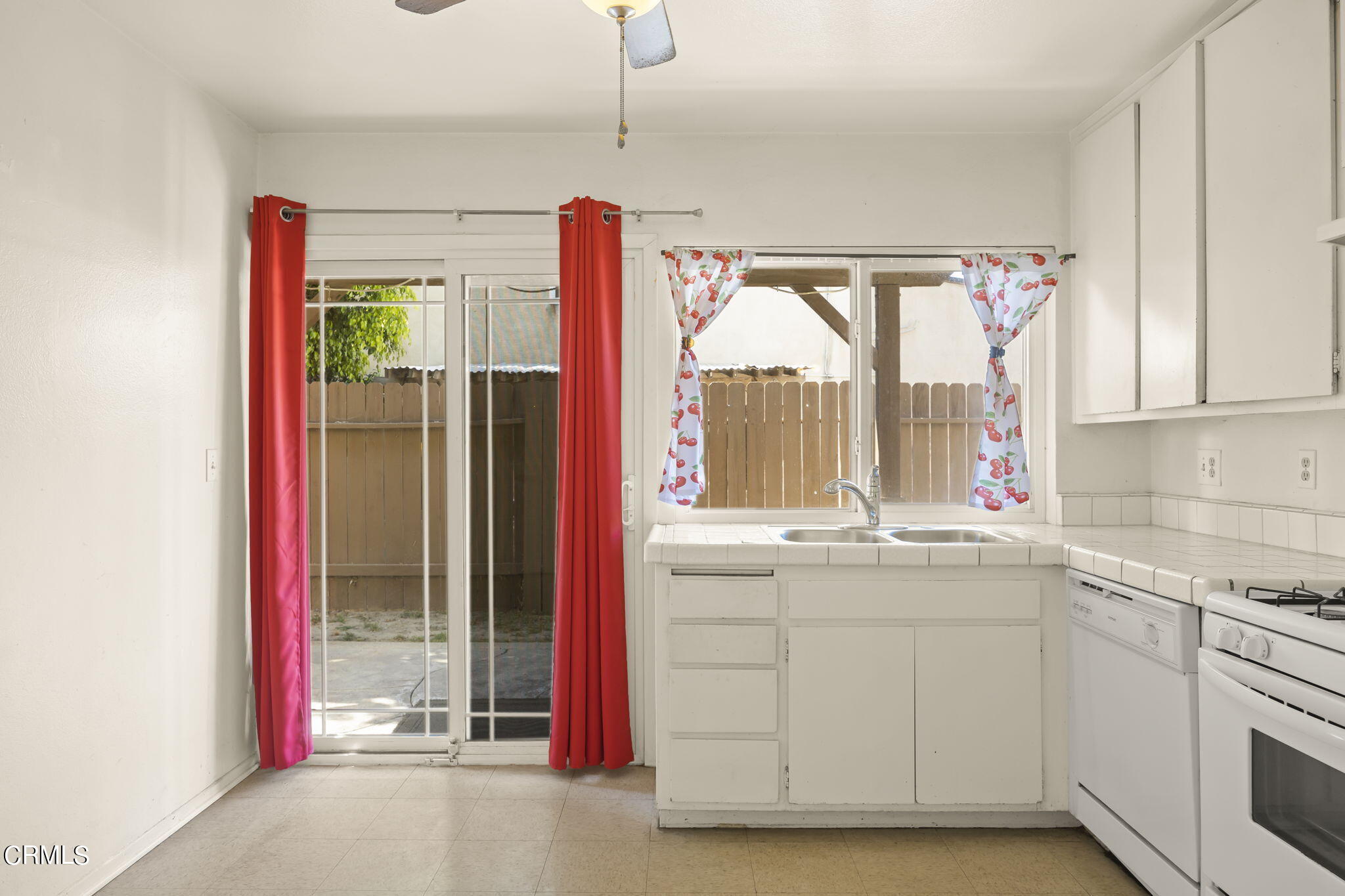 1106 Ojai Road Santa Paula, CA 93060 - Photo 12 of 45 a kitchen with a sink and cabinets