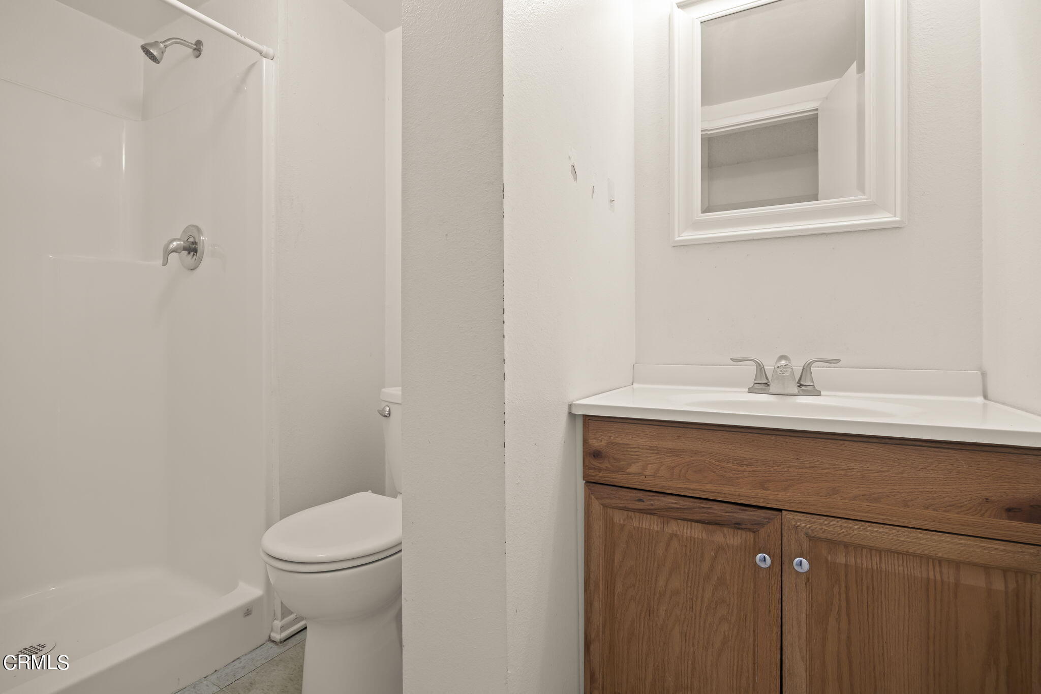 1106 Ojai Road Santa Paula, CA 93060 - Photo 15 of 45 a bathroom with a sink toilet and vanity