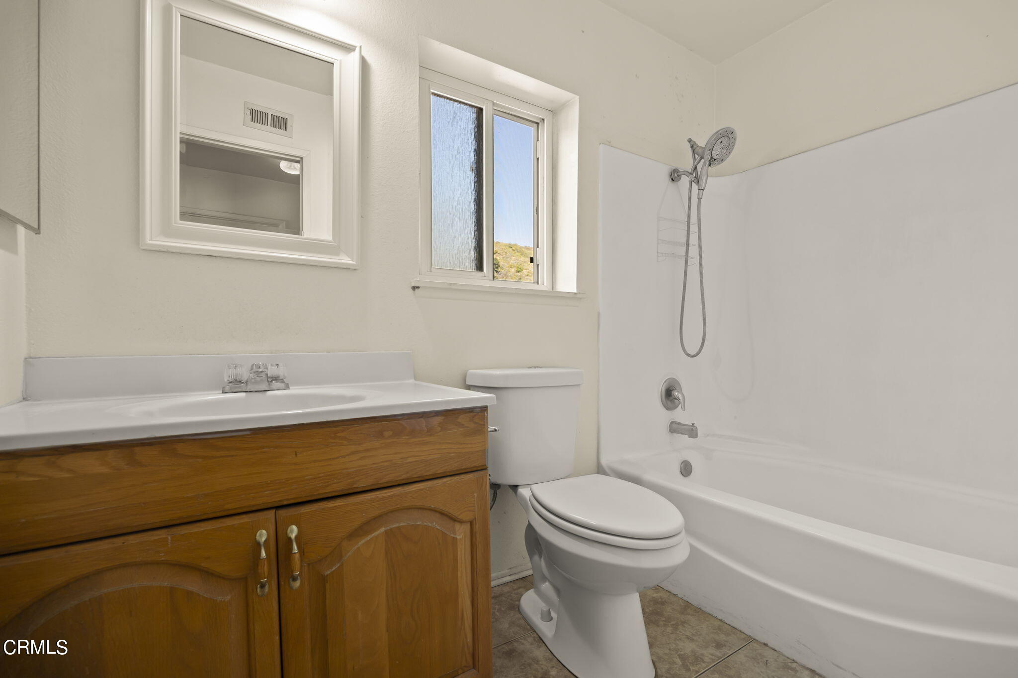 1106 Ojai Road Santa Paula, CA 93060 - Photo 18 of 45 a bathroom with a sink toilet and shower