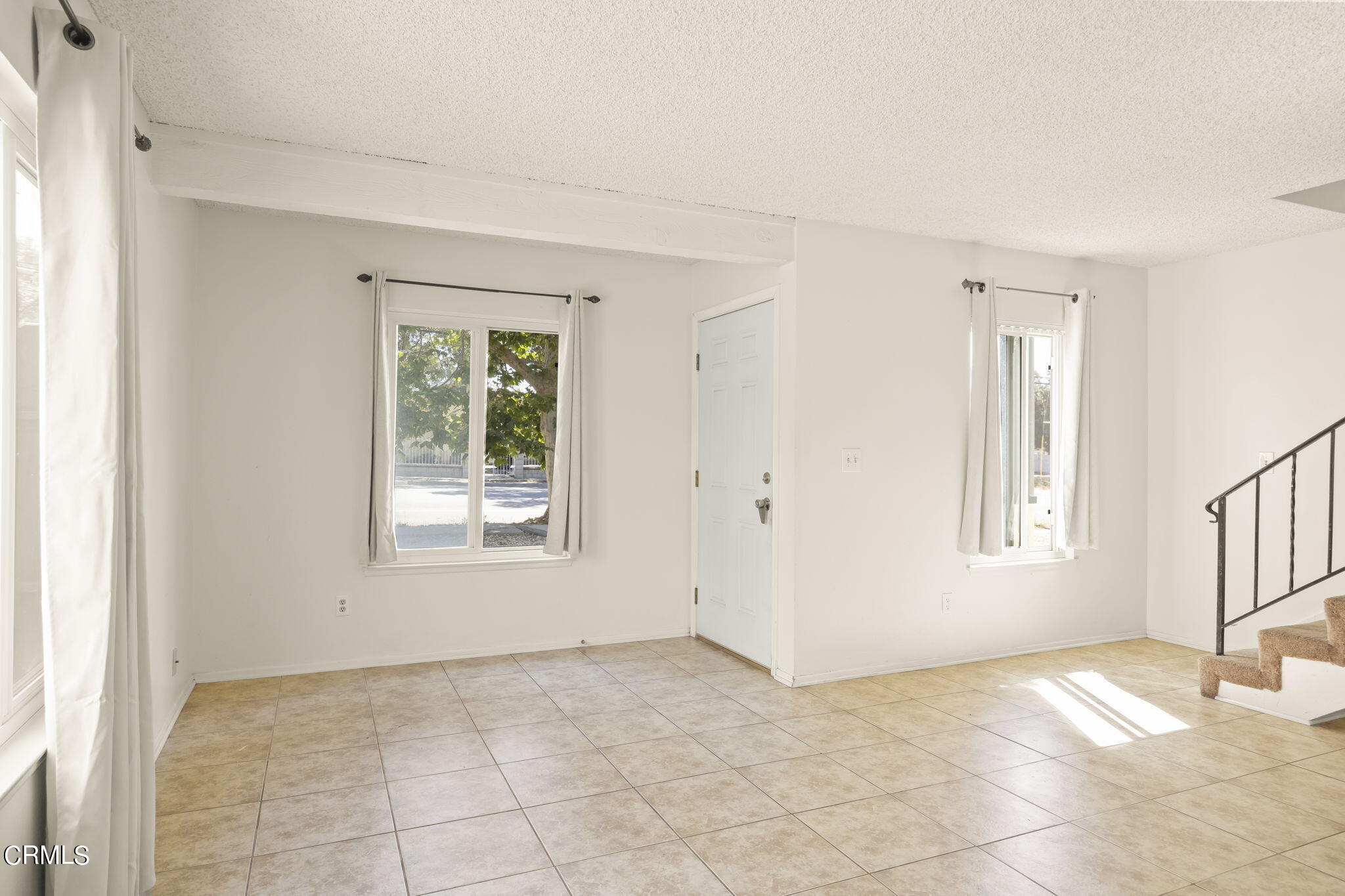 1106 Ojai Road Santa Paula, CA 93060 - Photo 26 of 45 an empty room with windows