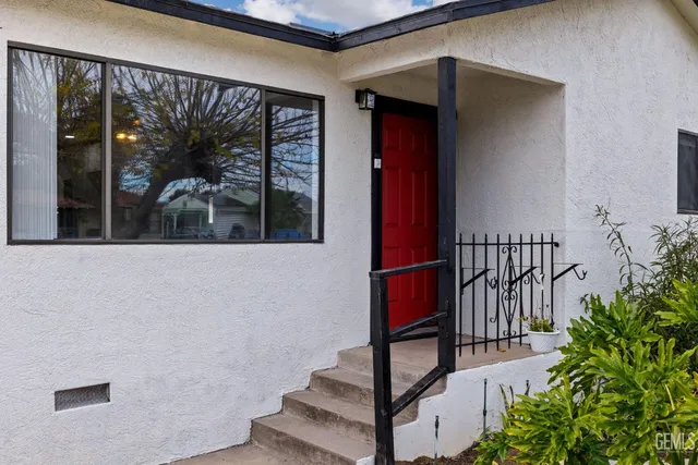 a view of balcony with furniture