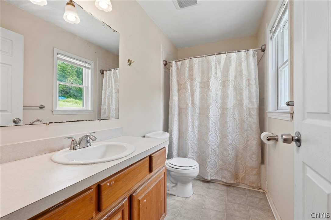 4615 Broad Road Onondaga, NY 13215 - Photo 25 of 47 Convenient primary bathroom designed for everyday