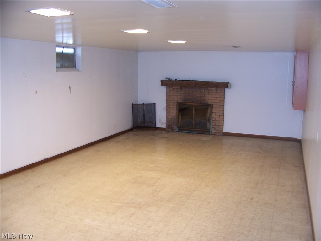 8944 South Kane Road Wadsworth, OH 44281 - Photo 9 of 11 Recreation room with fireplace