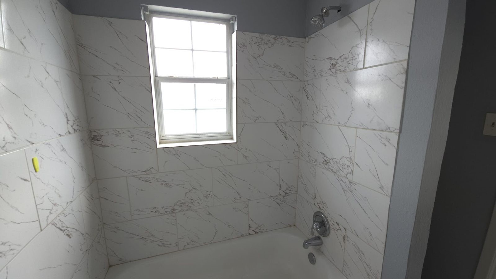 1012 Ann, Unit C Pasadena, TX 77506 - Photo 6 of 6 a bathroom with a window