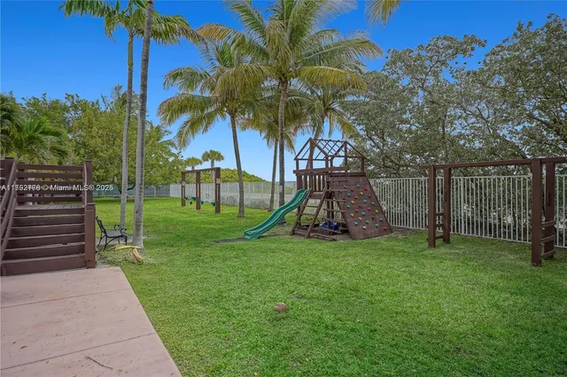a view of a park with a slide