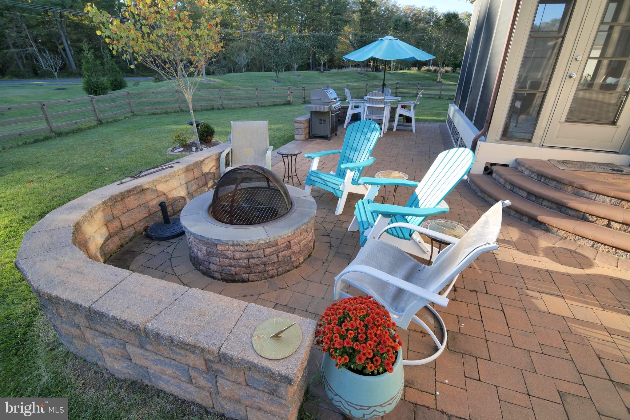 32731 Widgeon Road Ocean View, DE 19970 - Photo 30 of 36 Extensive hardscape and firepit