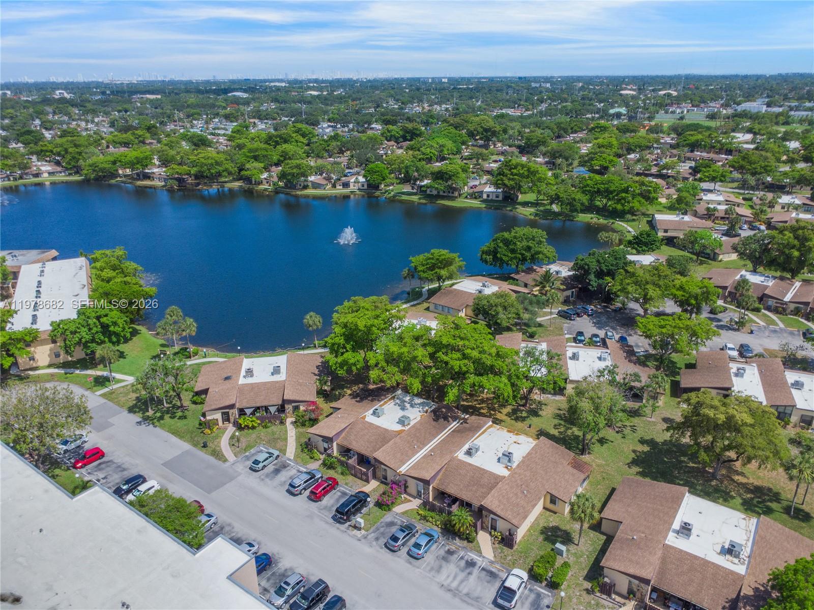 300 Berkley Road, Unit 108 Hollywood, FL 33024 - Photo 1 of 41 an aerial view of a city with lake view