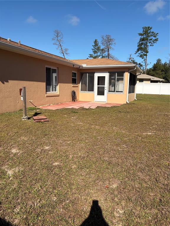 15405 Southwest 43rd Avenue Road Ocala, FL 34473 - Photo 24 of 27 a front view of a house with garden
