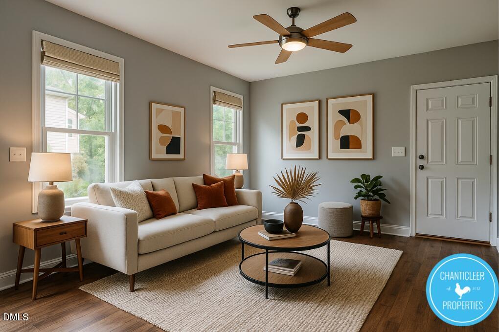911 Chaney Road, Unit 100 Raleigh, NC 27606 - Photo 1 of 19 a living room with furniture and a large window