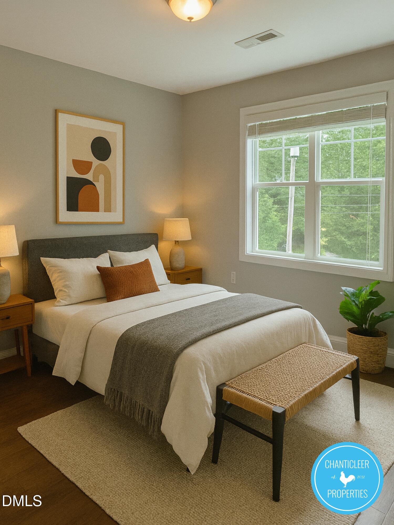 911 Chaney Road, Unit 100 Raleigh, NC 27606 - Photo 7 of 19 a bedroom with a bed and window