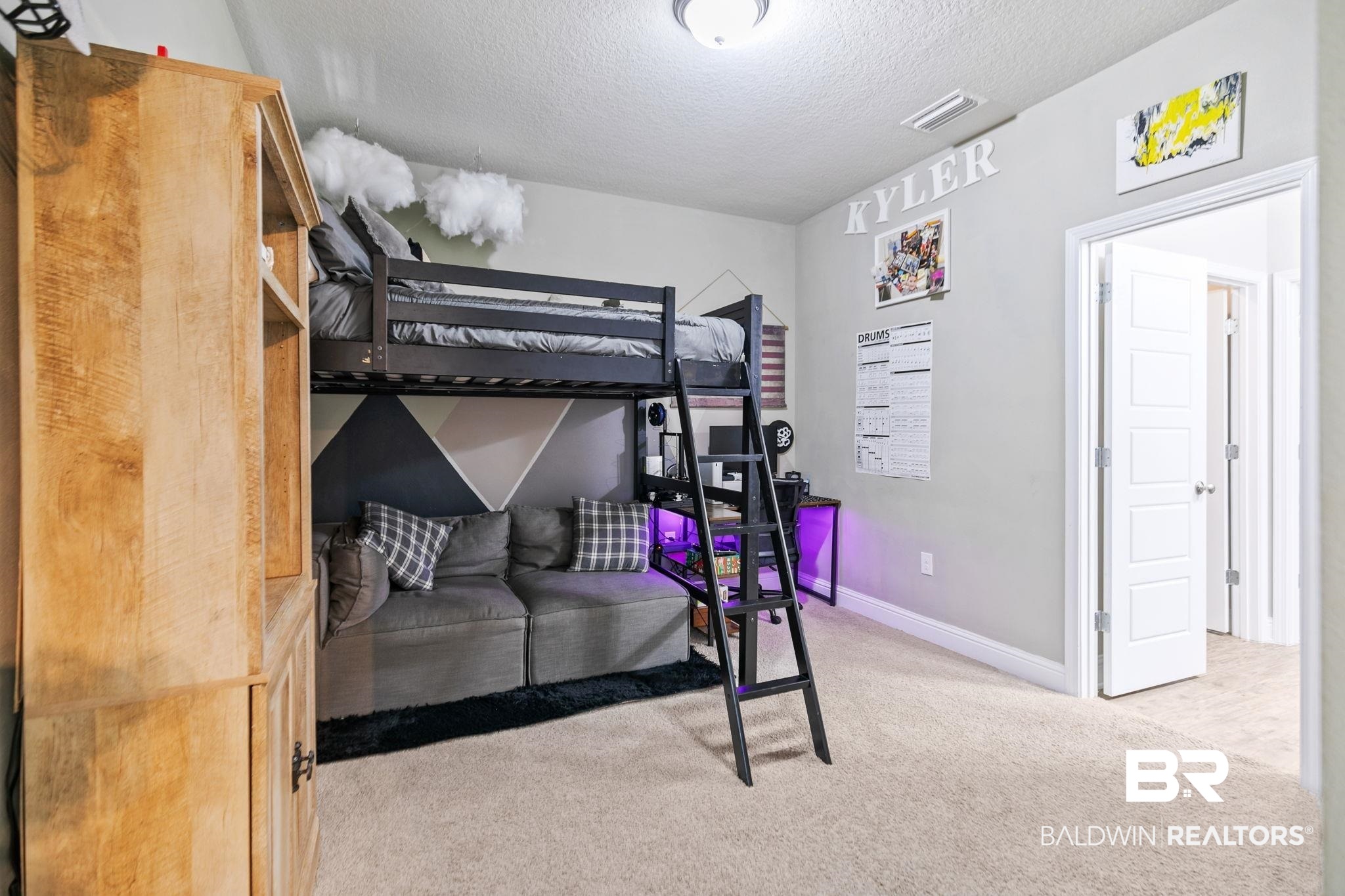 31402 Hoot Owl Road Daphne, AL 36527 - Photo 25 of 43 Bedroom with light carpet and a textured ceiling