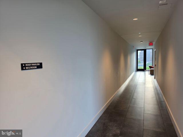 57 N Street Northwest, Unit 331 Washington, DC 20001 - Photo 14 of 18 a view of a hallway with wooden floor