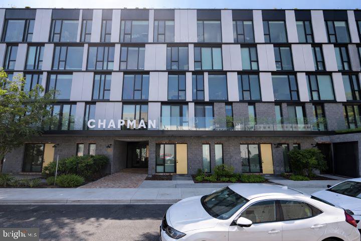 57 N Street Northwest, Unit 331 Washington, DC 20001 - Photo 2 of 18 a front view of a building and car parked