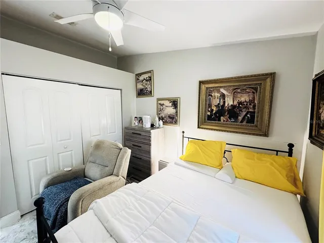 a bathroom with a toilet a sink and a mirror