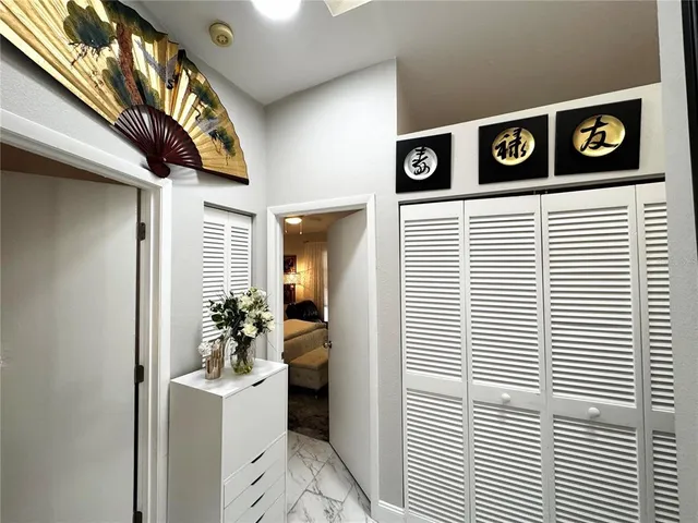 a bathroom with a bathtub and a window