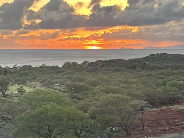a view of mountain view with mountains in the background